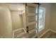 Bedroom closet featuring sliding barn doors, closet rack for clothes, and a natural light window at 4504 Winthrop Ave, Indianapolis, IN 46205