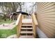 Wooden deck showcasing the home's tan siding and a view of the backyard at 4504 Winthrop Ave, Indianapolis, IN 46205