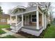 Inviting home with a covered front porch, perfect for relaxing and enjoying the neighborhood view at 4504 Winthrop Ave, Indianapolis, IN 46205
