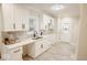 Modern kitchen featuring white cabinetry, updated countertops, and stainless steel appliances at 4504 Winthrop Ave, Indianapolis, IN 46205
