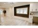 Open concept space featuring large windows and a connected seating space at 4504 Winthrop Ave, Indianapolis, IN 46205