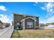 Spacious backyard with vinyl siding and a white picket fence and trampoline at 491 Tracewood Bnd, Greenfield, IN 46140