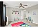 Playful ' bedroom with carpet, cartoon art, and cheerful decor at 491 Tracewood Bnd, Greenfield, IN 46140