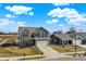 Beautiful two-story home with a well-kept lawn, a two-car garage and great curb appeal at 491 Tracewood Bnd, Greenfield, IN 46140