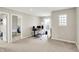 Spacious home office with a desk, computer setup, and natural light at 491 Tracewood Bnd, Greenfield, IN 46140