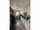 Functional kitchen with tile flooring and light-colored cabinetry at 4930 Candy Spots Dr, Indianapolis, IN 46237