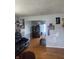 Inviting living room with hardwood floors leading to dining area at 4930 Candy Spots Dr, Indianapolis, IN 46237