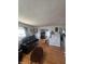 Spacious living room offering hardwood floors and a bright, airy feel at 4930 Candy Spots Dr, Indianapolis, IN 46237