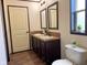 Bathroom with a double vanity and tiled floors at 5010 S 550 W, Columbus, IN 47201