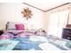 Inviting bedroom with a decorative wall art and a comfortable bed, creating a serene and stylish retreat at 5010 S 550 W, Columbus, IN 47201