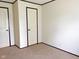 Standard bedroom with carpet and neutral walls at 5010 S 550 W, Columbus, IN 47201