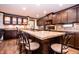Modern kitchen featuring sleek countertops, a large island, and seating for six at 5010 S 550 W, Columbus, IN 47201