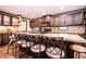 Modern kitchen featuring sleek countertops, a large island, and seating for six at 5010 S 550 W, Columbus, IN 47201