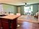Comfortable living room with neutral decor and view from eat in kitchen at 5010 S 550 W, Columbus, IN 47201