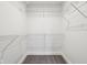 A walk-in closet with wire shelving, offering functional storage space for clothes and accessories at 5520 N Woodside Ct, McCordsville, IN 46055