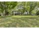 Great backyard with mature trees; great for outdoor fun and relaxation at 569 King Dr, Indianapolis, IN 46260
