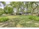 Sprawling backyard with lush green grass, perfect for outdoor activities and entertaining at 569 King Dr, Indianapolis, IN 46260