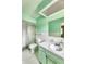 Bright bathroom with white tile, shower and vanity offering a clean, functional space at 569 King Dr, Indianapolis, IN 46260