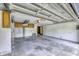 Large garage with cabinets, shelving, and ample space for storage and projects at 569 King Dr, Indianapolis, IN 46260