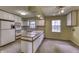 Functional kitchen with ample cabinet space and eat-in area at 569 King Dr, Indianapolis, IN 46260