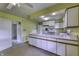 Bright eat-in kitchen featuring an island and modern appliances at 569 King Dr, Indianapolis, IN 46260