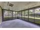 Spacious screened-in porch with views of the backyard at 569 King Dr, Indianapolis, IN 46260