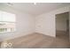 Bright bedroom featuring neutral carpet, a window, closet and an ensuite bathroom at 5908 Agogo Way, Greenwood, IN 46143