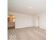 Large carpeted bedroom with attached bathroom and closet with double doors at 5908 Agogo Way, Greenwood, IN 46143