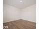 Unfurnished room with hardwood floors, a blank canvas ready for your design ideas at 5908 Agogo Way, Greenwood, IN 46143