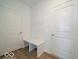 Functional mudroom features a built-in bench and hooks, creating an organized entryway at 5908 Agogo Way, Greenwood, IN 46143