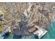 Aerial view featuring a charming home with dock access and lush landscaping at 6198 Grosbeak Dr, Nineveh, IN 46164