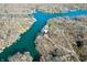 Stunning aerial view of lakefront property with docks and waterfront homes nestled among the trees at 6198 Grosbeak Dr, Nineveh, IN 46164
