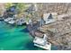 Picturesque aerial view of lakefront home with private dock, ideal for waterside living at 6198 Grosbeak Dr, Nineveh, IN 46164