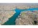 Panoramic aerial view showcases the lakefront homes and docks along the serene waterway at 6198 Grosbeak Dr, Nineveh, IN 46164