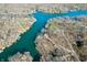 Scenic aerial view of lakefront real estate featuring private docks along the beautiful tree lined shores at 6198 Grosbeak Dr, Nineveh, IN 46164