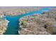 Stunning aerial image of lake community surrounded by lush, forested landscapes at 6198 Grosbeak Dr, Nineveh, IN 46164