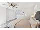 Bright bedroom with peaked ceiling, ceiling fan, and cozy furnishings at 6198 Grosbeak Dr, Nineveh, IN 46164