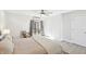 Comfortable bedroom featuring a ceiling fan and access to a private balcony at 6198 Grosbeak Dr, Nineveh, IN 46164