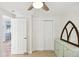 Bedroom with double closets, ceiling fan, and light green bureau at 6198 Grosbeak Dr, Nineveh, IN 46164