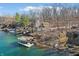 Charming waterfront home featuring a private boat dock for easy lake access and enjoyment at 6198 Grosbeak Dr, Nineveh, IN 46164