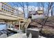 Lakeside home with stairway access, featuring waterfront amenities like a boat dock and outdoor seating for enjoying lake views at 6198 Grosbeak Dr, Nineveh, IN 46164