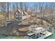 Lake house with balcony and dock access provides outdoor living space at 6198 Grosbeak Dr, Nineveh, IN 46164