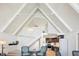 Bright living room with vaulted ceilings leading to an updated kitchen with stainless steel appliances at 6198 Grosbeak Dr, Nineveh, IN 46164