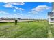 Spacious backyard with well-maintained lawn, overlooking construction of additional homes at 7158 Rose Hill Ave, Brownsburg, IN 46112