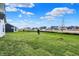 Expansive backyard with a well-maintained lawn in a new residential development at 7158 Rose Hill Ave, Brownsburg, IN 46112