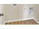 Close up of laundry hookups and fresh, light flooring in the laundry area at 7158 Rose Hill Ave, Brownsburg, IN 46112