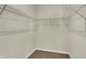 Walk-in closet with white wire shelving, ready for organizing clothes and accessories at 7158 Rose Hill Ave, Brownsburg, IN 46112