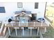 Aerial view of the back of the home featuring a deck with a gazebo and outdoor furniture at 7418 W Old Sr 252, Edinburgh, IN 46124