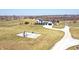 Expansive property featuring a modern farmhouse, basketball court, and large open fields at 7418 W Old Sr 252, Edinburgh, IN 46124