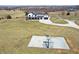 Features a basketball court with the farmhouse in the background at 7418 W Old Sr 252, Edinburgh, IN 46124